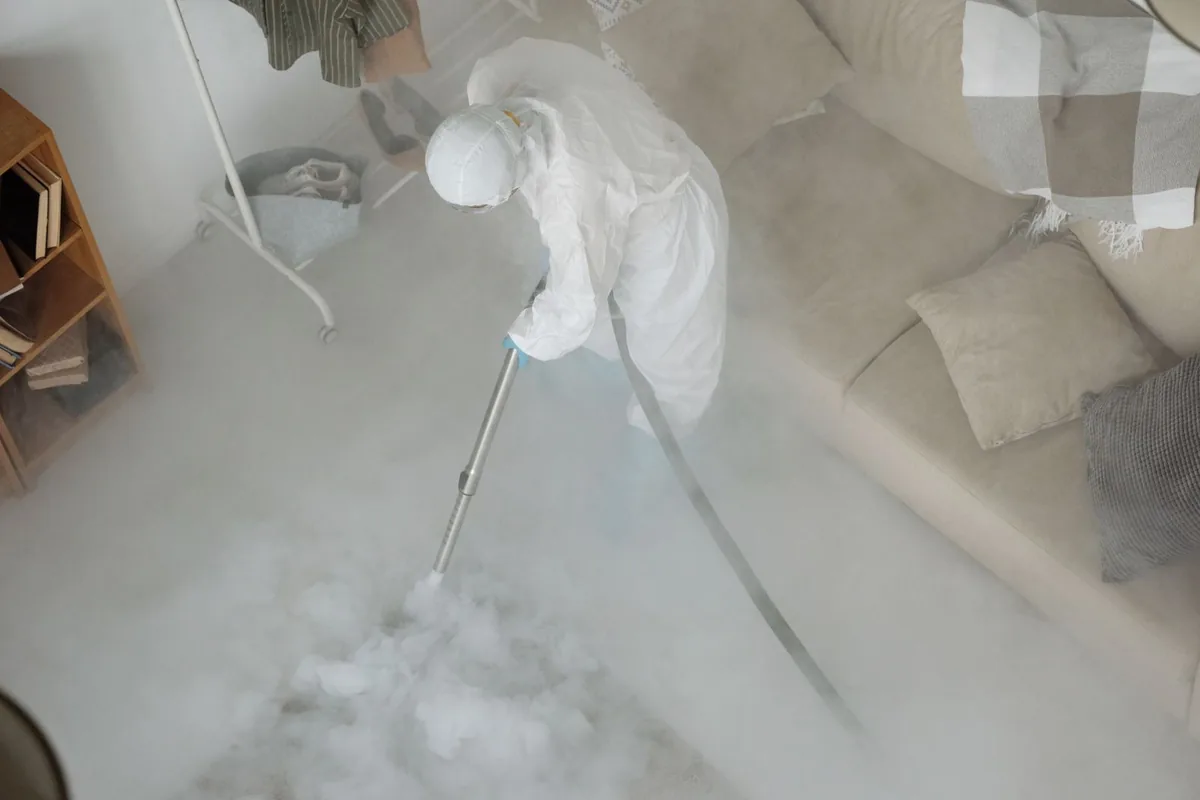 Biohazard cleanup technician in protective equipment, West Myerstown, PA